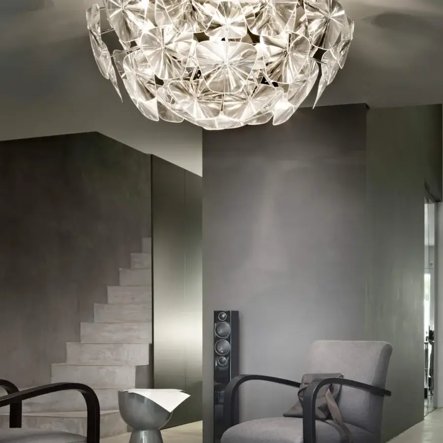 Distinguished Luceplan Hope ceiling lamp crafted in transparent polycarbonate with a polished stainless-steel frame