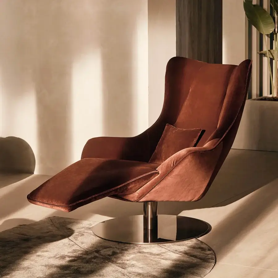 Distinguished Visionnaire Selfless lounge chair with reddish-brown fabric upholstery and polished steel swivel base