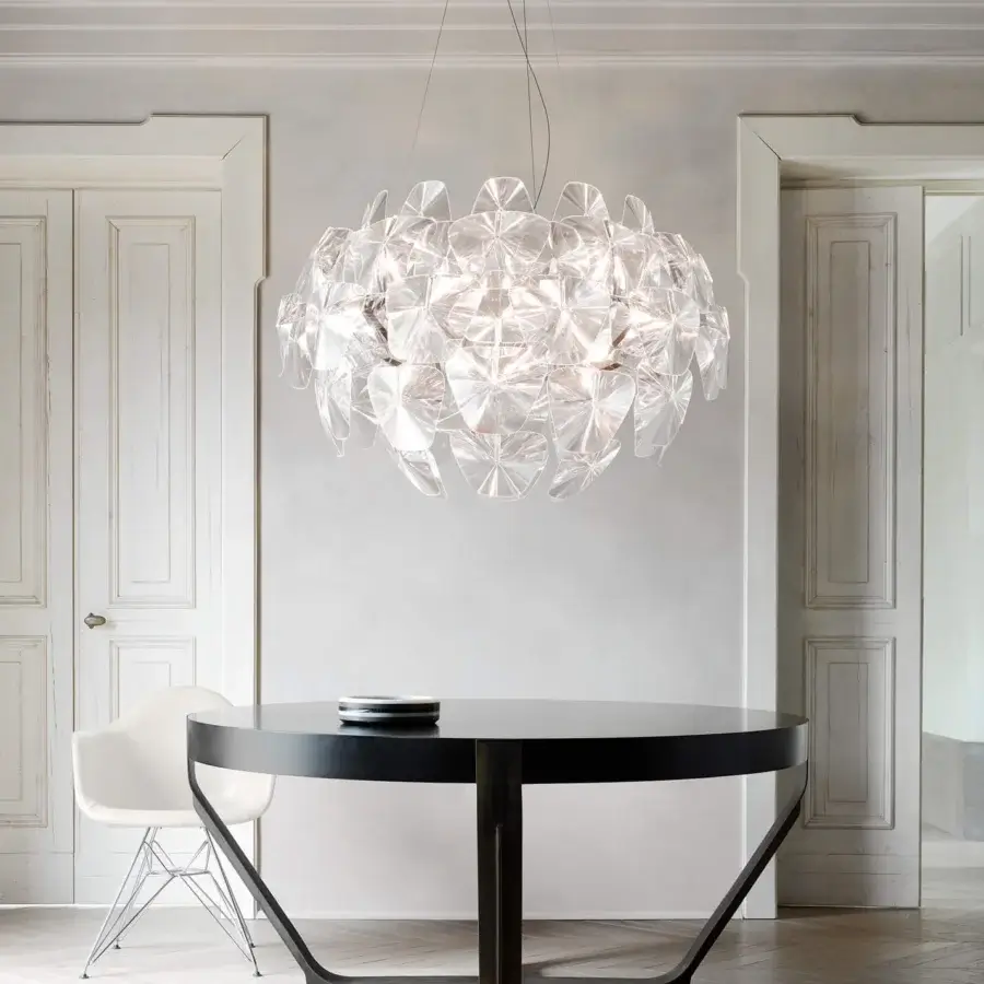 Distinguished Luceplan Hope suspension lamp with a cloud-like form crafted in clear, glossy faceted methacrylate Fresnel lenses