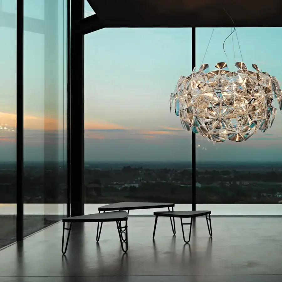 Superior Luceplan Hope suspension lamp with lightweight methacrylate Fresnel lenses and polished reflective silver finish