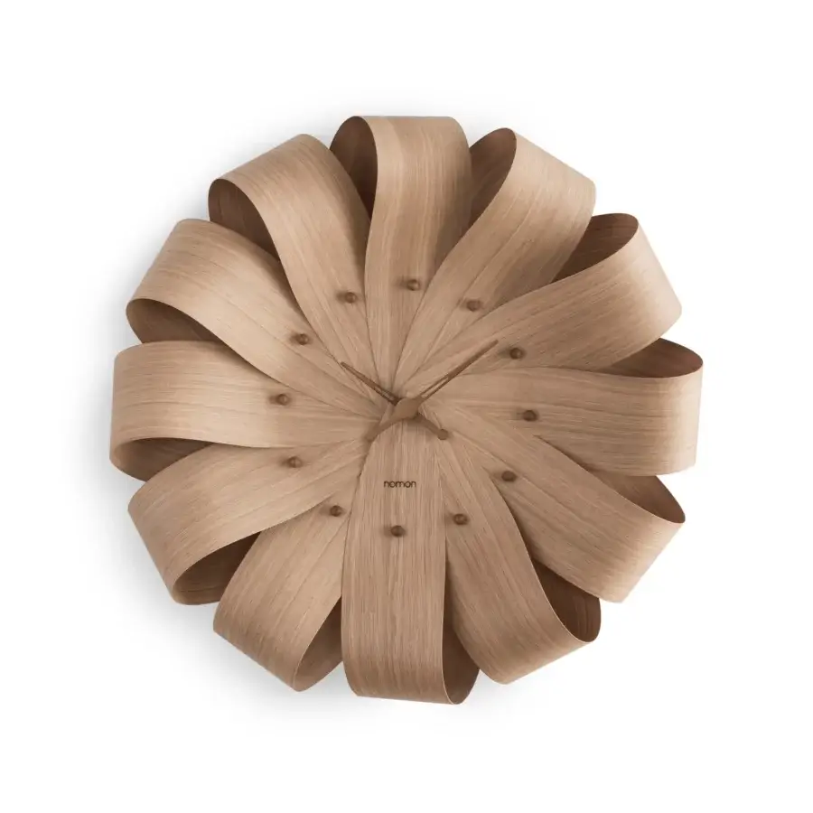 Exceptional Nomon Brisa Wall Clock crafted in walnut wood with a satin finish and flowing floral silhouette