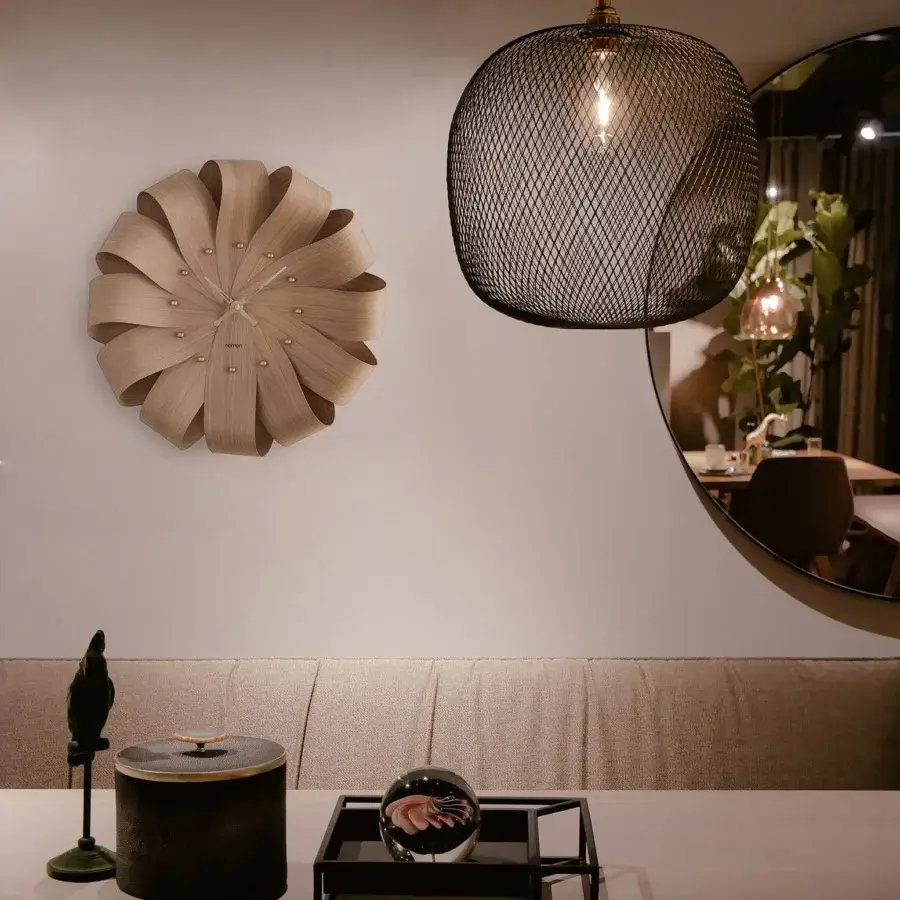 Captivating Nomon Brisa Wall Clock crafted in natural oak with a matte finish and flower-like silhouette