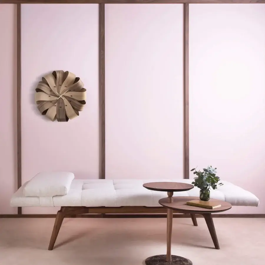 Exceptional Nomon Brisa Wall Clock crafted in natural oak with a smooth satin finish and radiating wooden slats