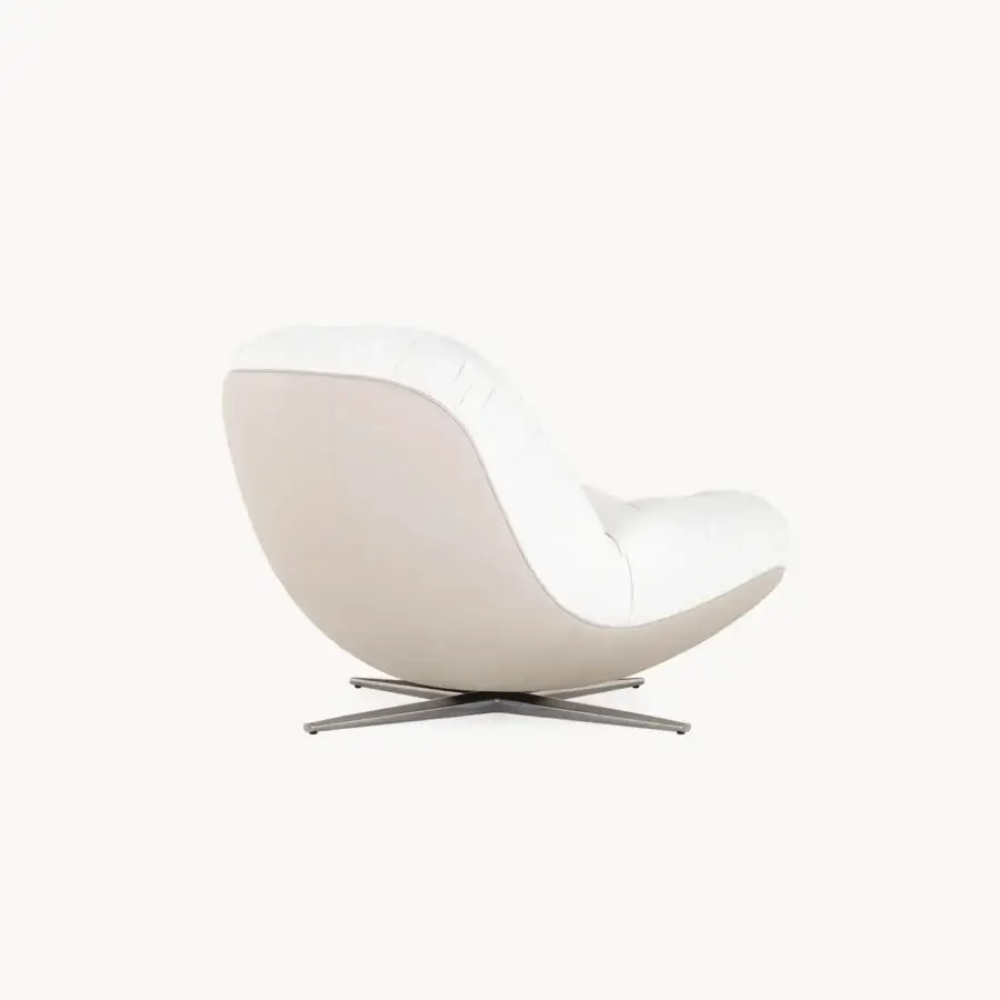 Superior Visionnaire Aura lounge chair with sculpted wooden shell upholstered in creamy white fabric and satin metal swivel base