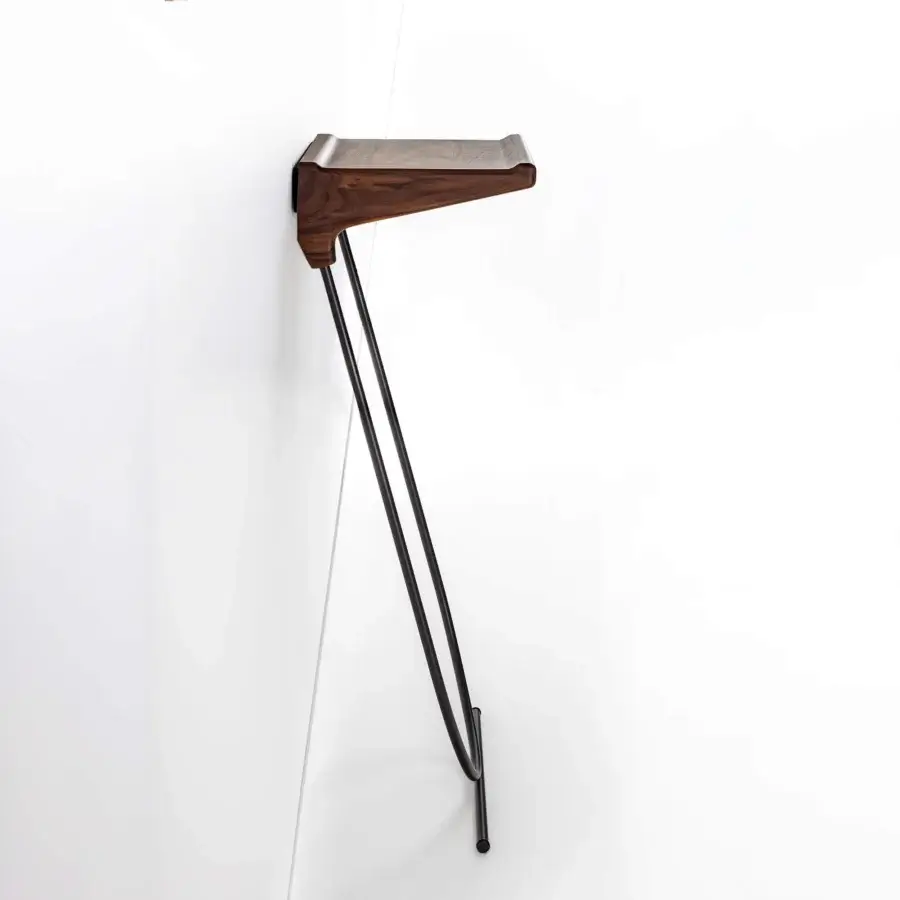 Exceptional Porada Maori console built with a solid canaletta walnut top and pewter grey metal frame with a satin finish