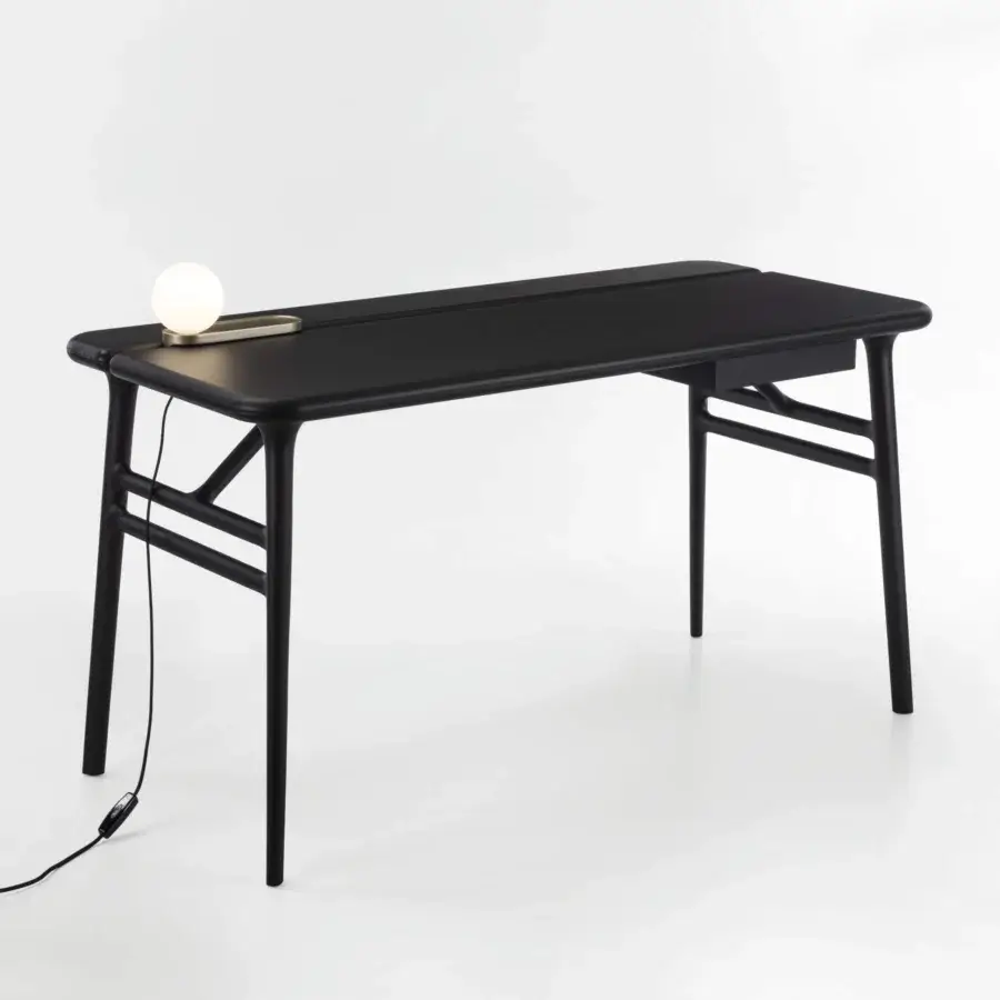 Exceptional Porada Aksel desk in solid Canaletto walnut with a matte finish and a distinctive two-part top design
