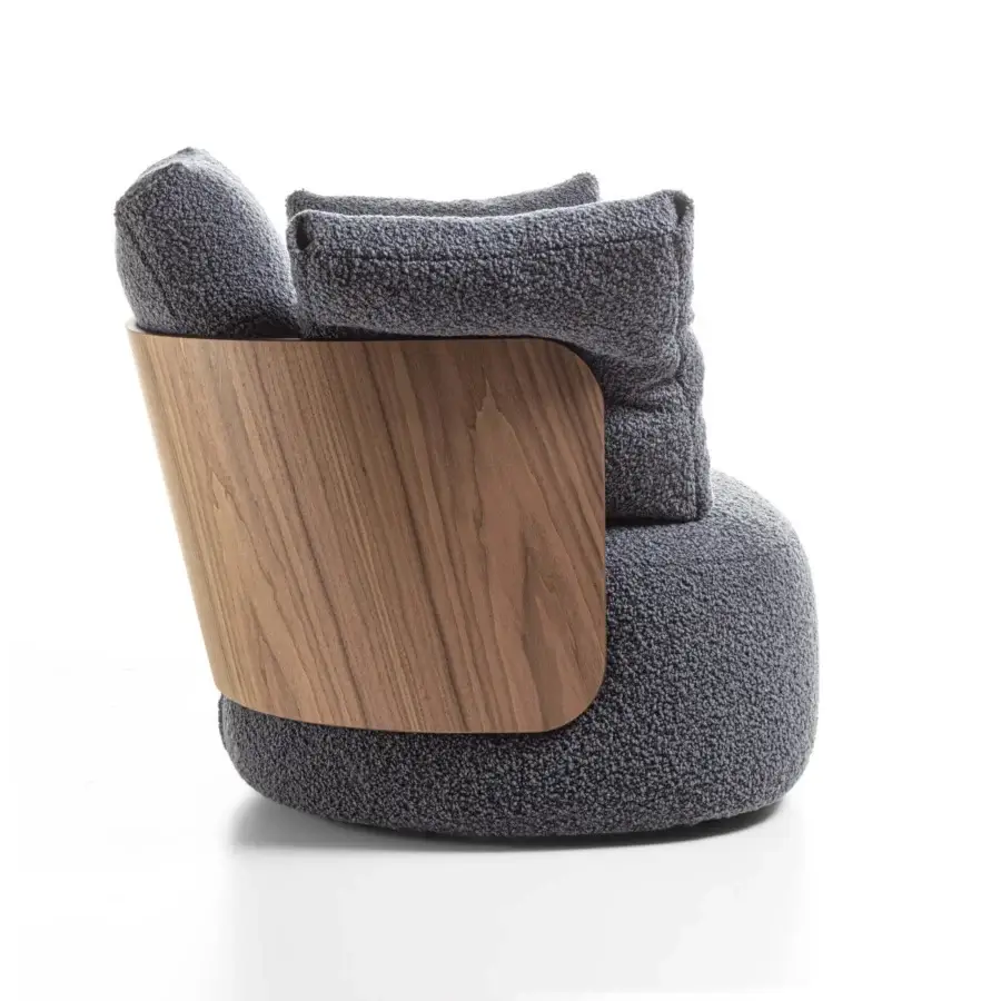 Elegant Porada Calin armchair with curved Canaletto walnut backrest and muted gray textured textile upholstery, built with a satin finish