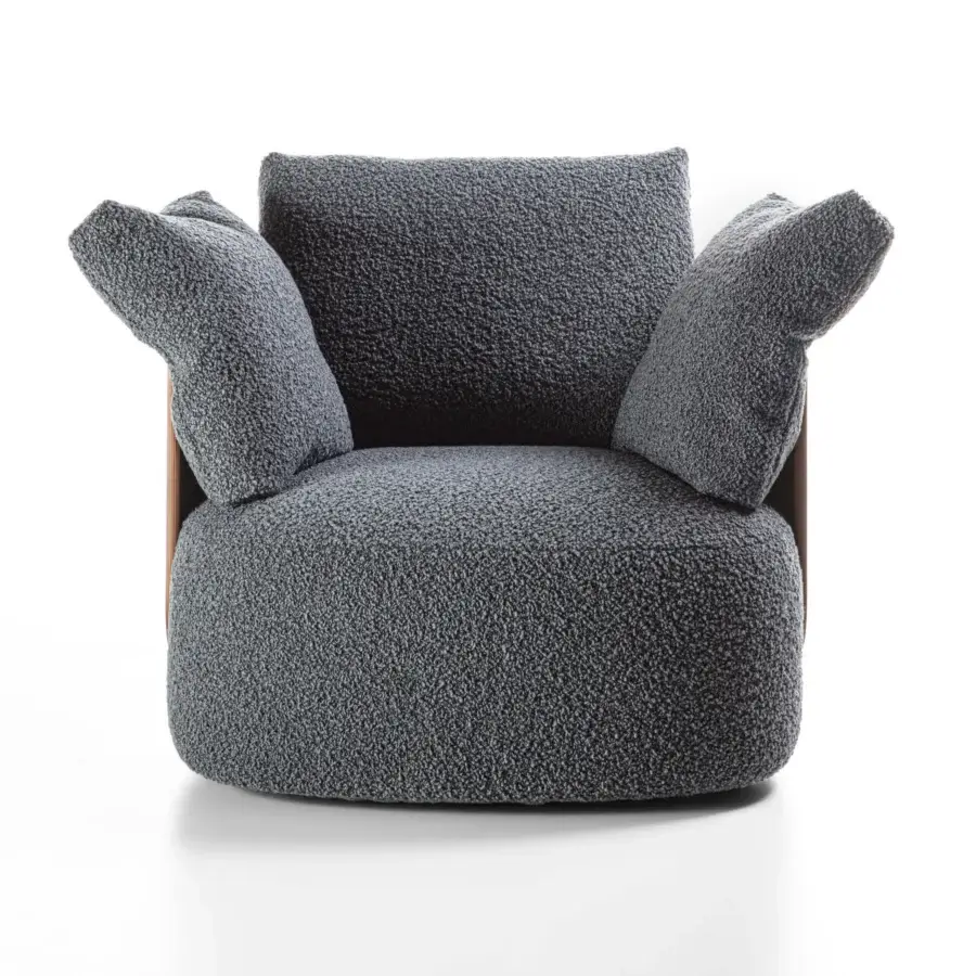 Sophisticated Porada Calin armchair with gracefully curved Canaletto walnut backrest and textured muted gray bouclé upholstery