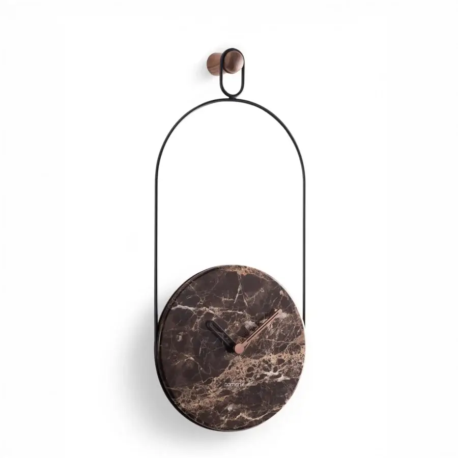 Distinctive Nomon Eslabón Wall Clock crafted with polished marble and matte black metal offering unique natural veining