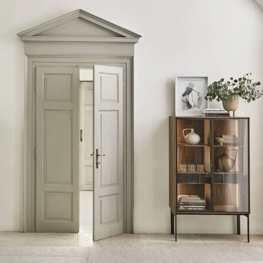 Superior Porada Matics 2 cabinet crafted in medium-toned brown wood with textured bronze metal back panels and integrated lighting