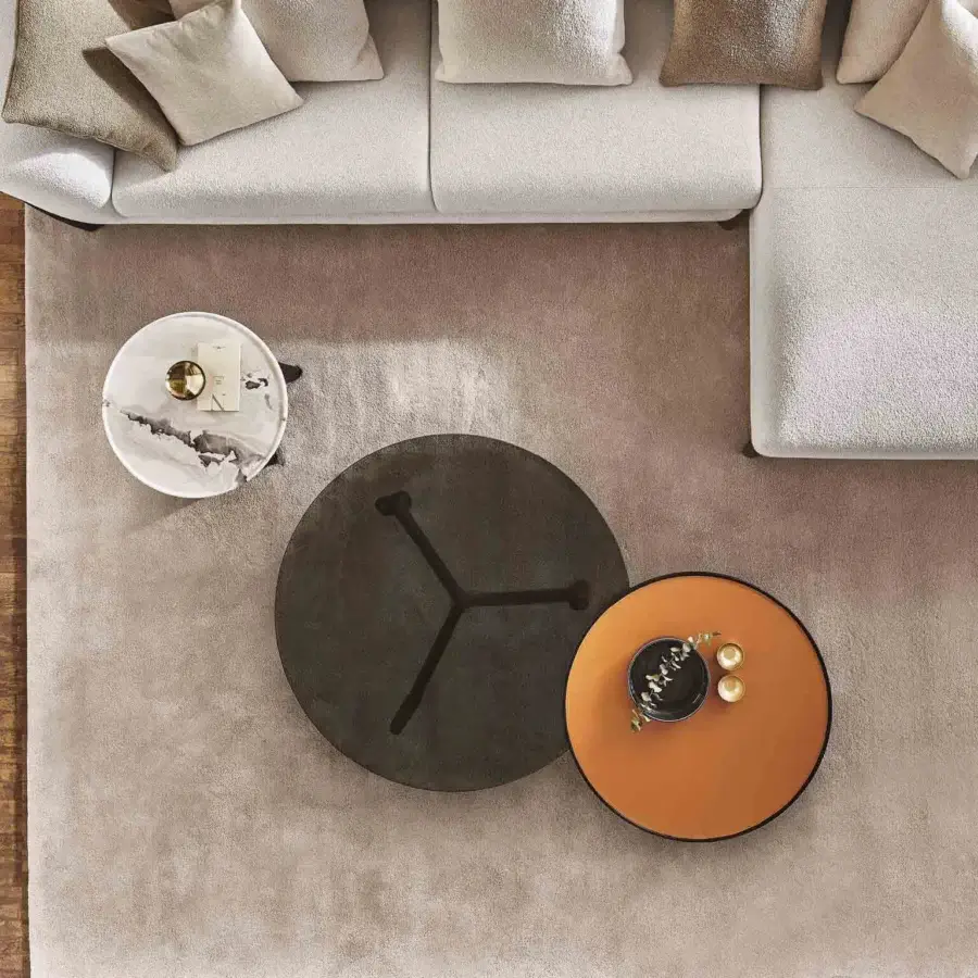 Elegant Porada Tillow coffee table with dark gray carved marble top and solid canaletto walnut base crafted with a smooth finish