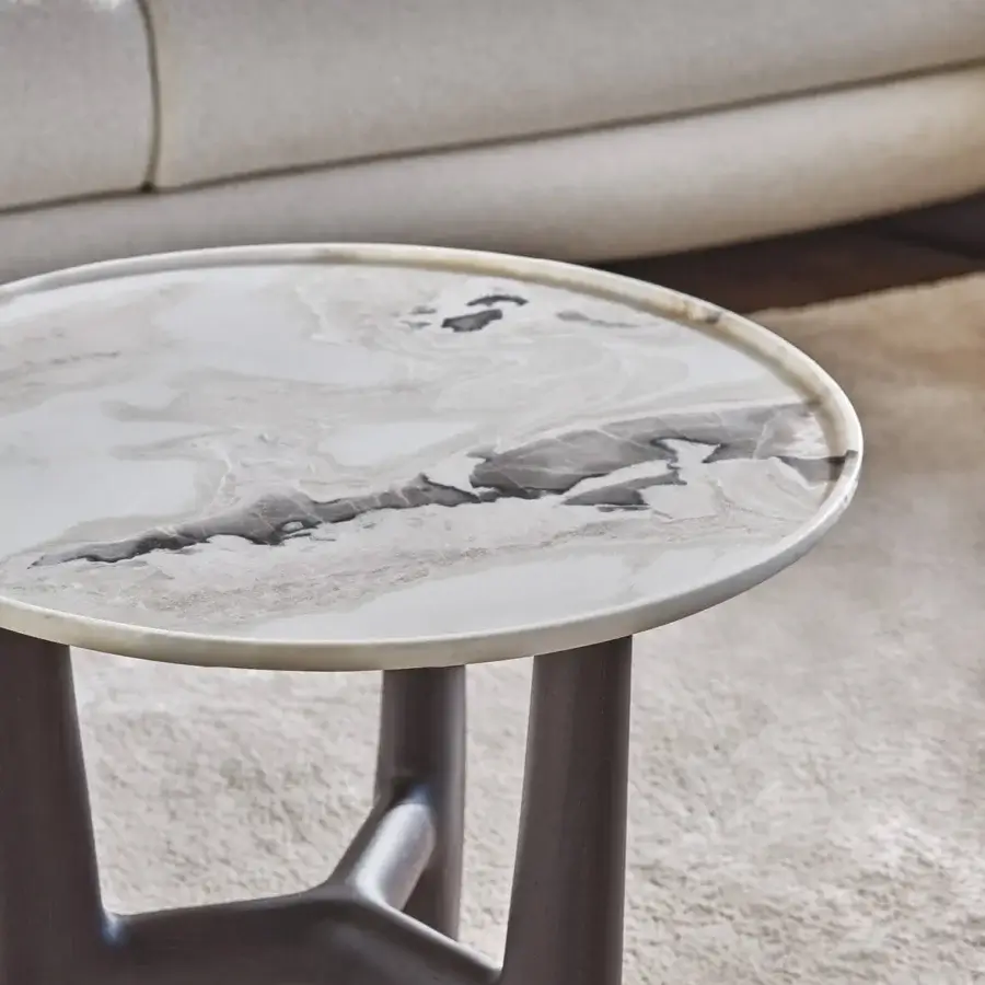Superior Porada Tillow coffee table with carved marble displaying grey veining and a dark-toned canaletto walnut base