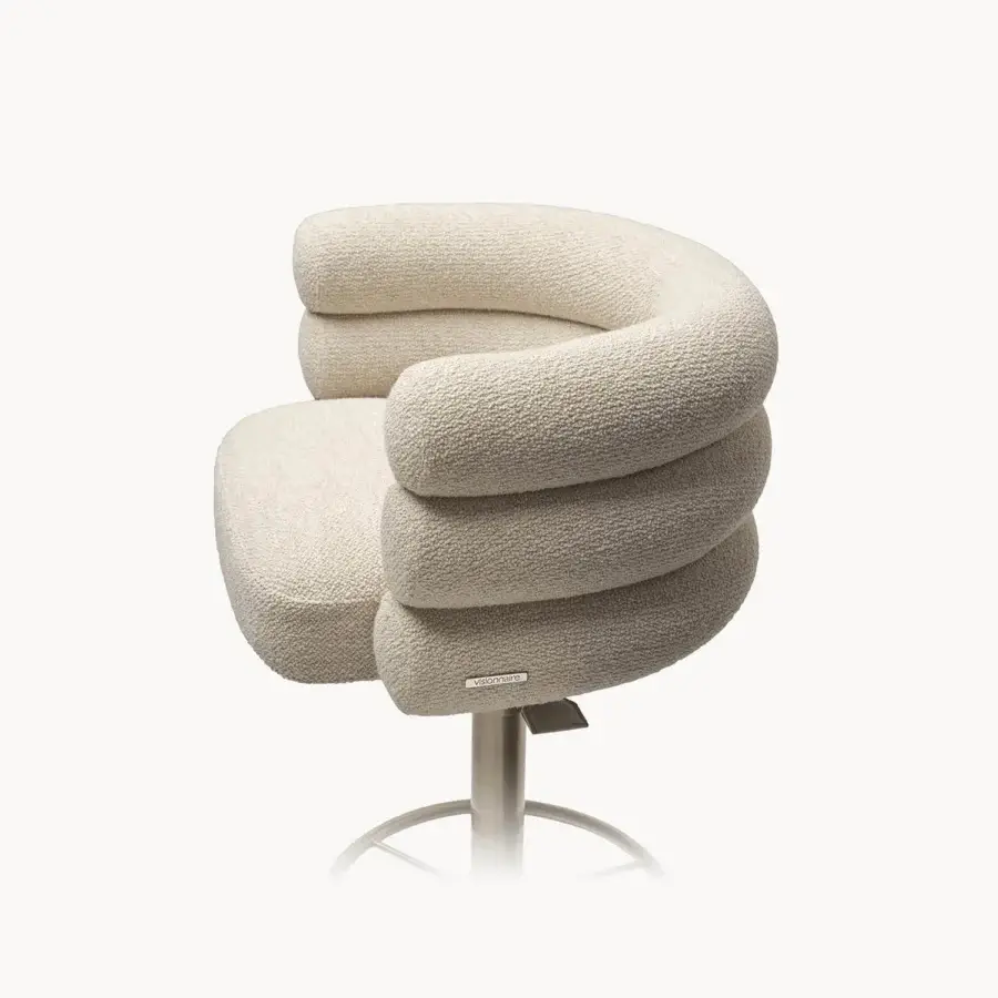 Elegant Visionnaire Voluptas stool upholstered in neutral beige textured textile with curved cylindrical bands and a turned stainless steel swivel base