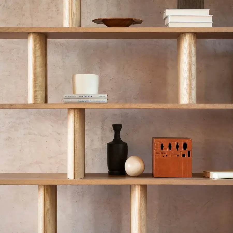 Exceptional Potocco Pages bookshelf in sinuous solid ash wood with a matte pale beige-brown finish and cylindrical supports
