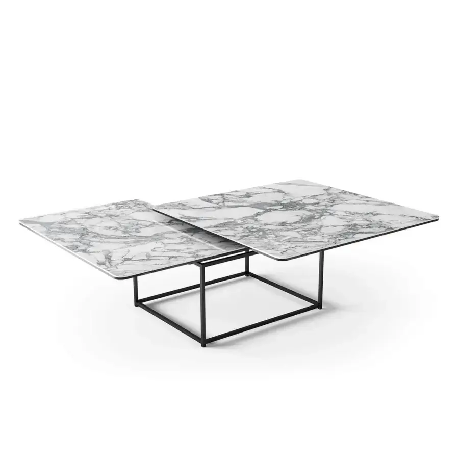 Elegant Naos Magellano coffee table with a white and gray marble-like ceramic top and polished black painted steel base