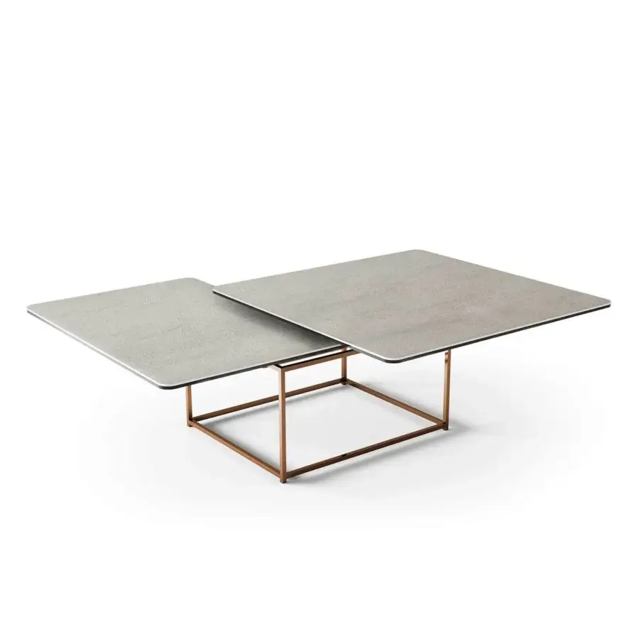 Distinguished Naos Magellano coffee table with grey ceramic and golden-brown galvanized steel base exhibiting a layered effect