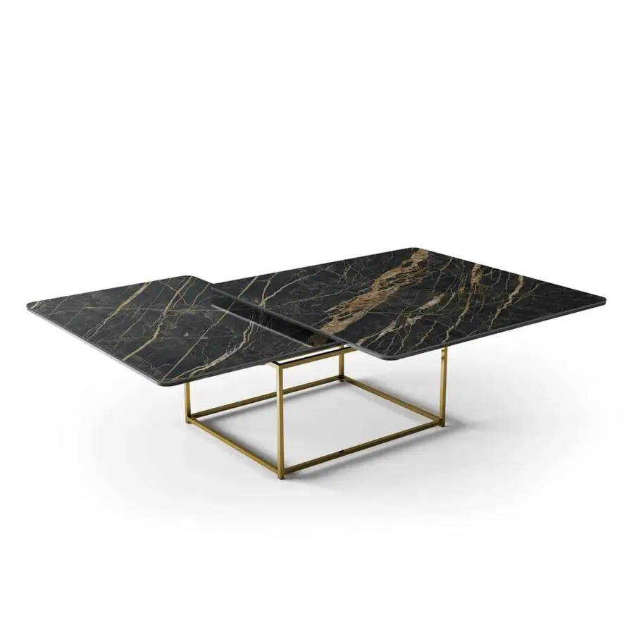 Exceptional Naos Magellano coffee table with dark ceramic and gold-toned galvanized steel, exhibiting a polished finish and overlapping design