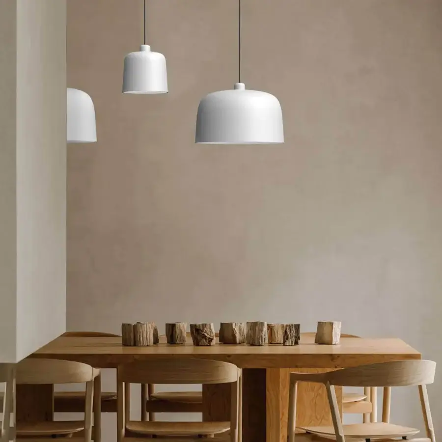 Elegant Luceplan Zile suspension lamp with gently curved cylindrical silhouette crafted in white matte bio-plastic and durable steel