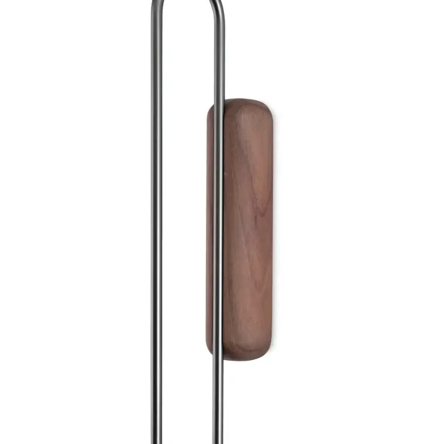 Refined Nomon Micro Daro wall clock with a satin wood panel and polished brass bezel presenting contrasting warm tones