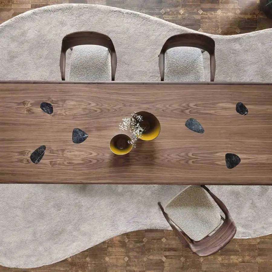 Exceptional Porada Osmose table crafted in canaletto walnut with satin finish and droplet marble inserts