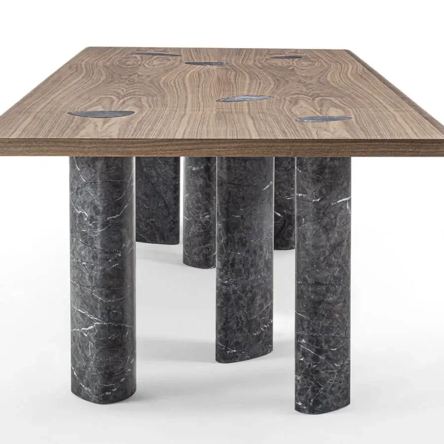 Superior Porada Osmose table crafted in canaletto walnut with striking marble legs and a satin finish