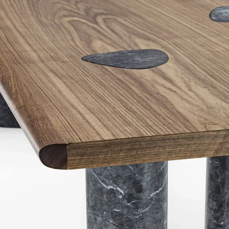 Exceptional Porada Osmose table crafted in canaletto walnut with marble inserts and satin finish