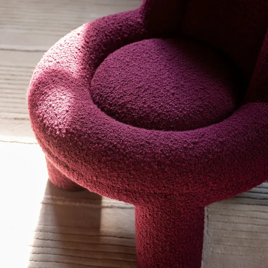 Distinguished Potocco Softy lounge chair with burgundy textured stretch fabric upholstery and sinuous form