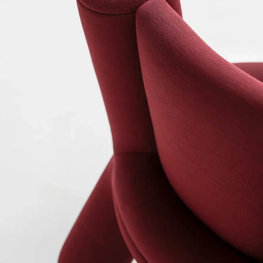 Elegant Potocco Softy lounge chair with fully upholstered design in burgundy Kvadrat stretch fabric and matte finish