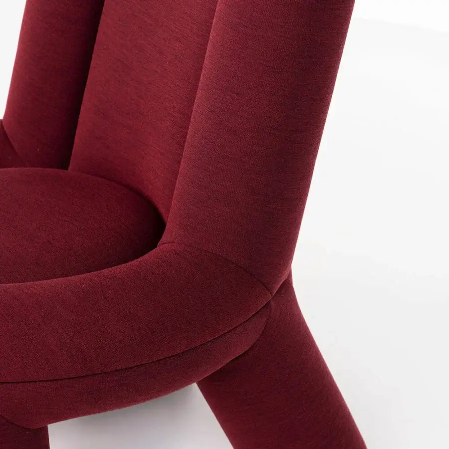Distinguished Potocco Softy lounge chair with fully upholstered form in burgundy textured Kvadrat Bess, Cortina, Dolly or Uniform Melange fabric