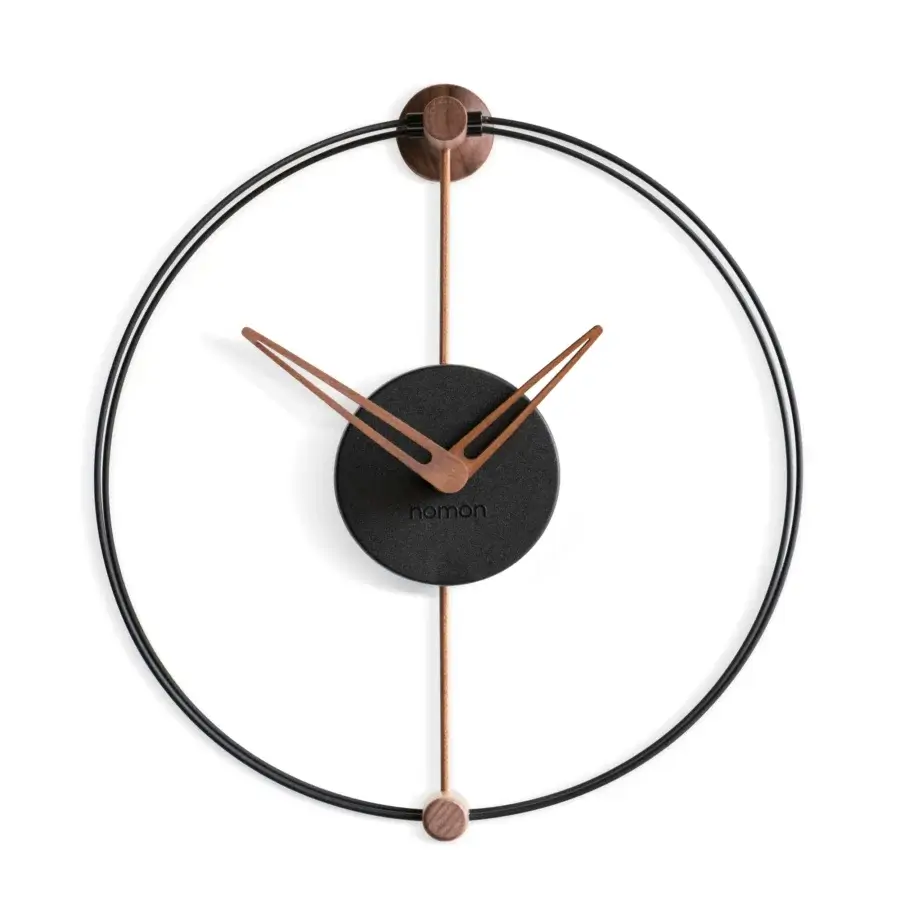 Elegant Nomon Nano wall clock crafted with light wood, black metal and a dark matte face with satin finish