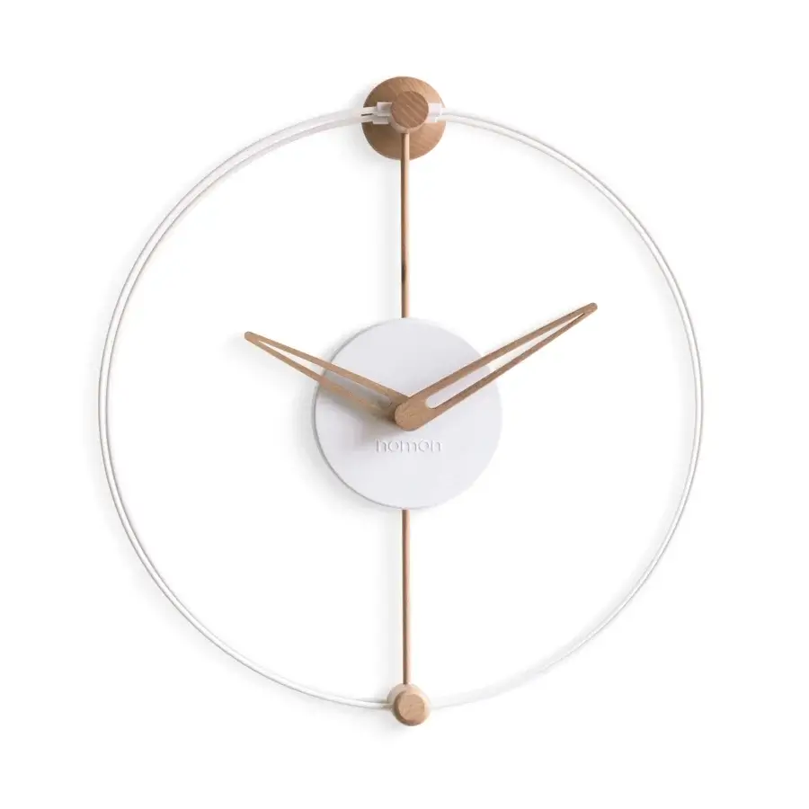Distinguished Nomon Nano wall clock with a smooth white face, walnut wood and a sleek white metal frame in matte/satin finish