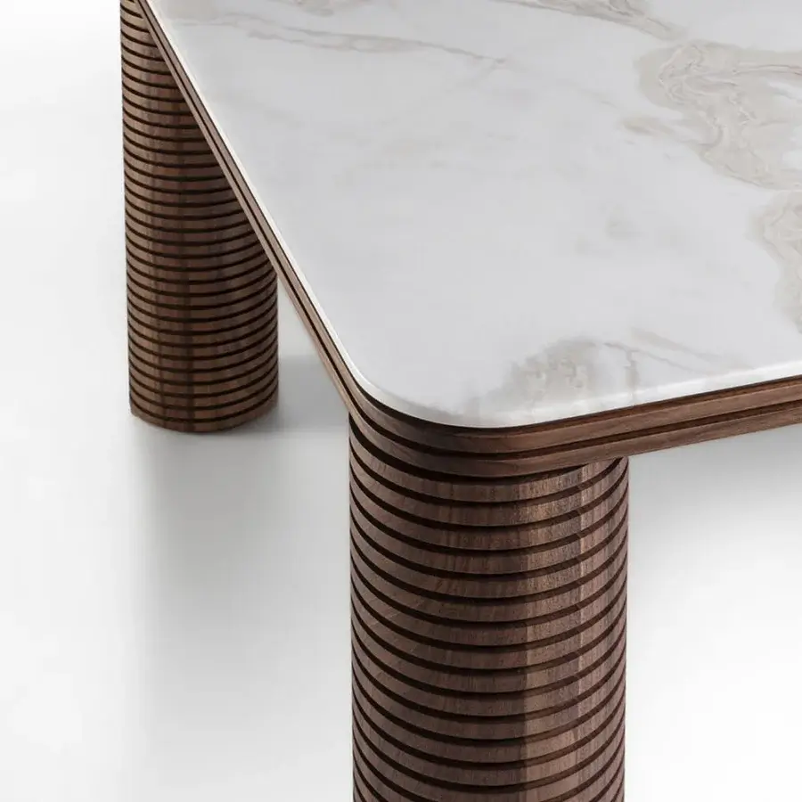 Superior Porada Sansiro table with polished white marble and solid canaletto walnut built with uniquely sculpted, ribbed legs