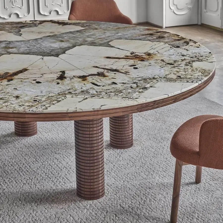 Architectural Porada Sansiro round table with complex white, grey, and brown marble and solid canaletto walnut frame