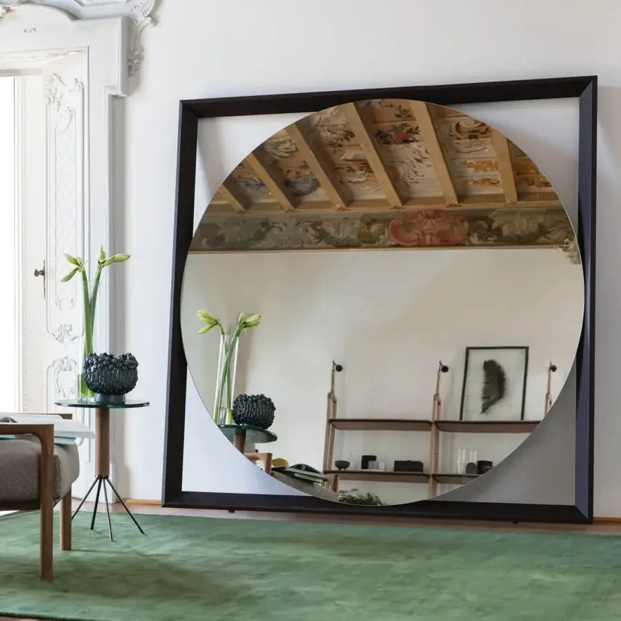 Elegant Porada Odino mirror with a geometric design in dark matte ash wood and circular glass