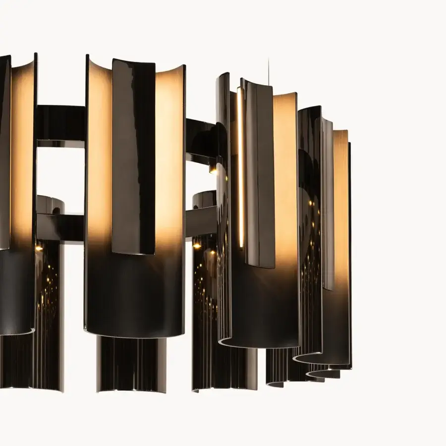 Distinguished Visionnaire Polaris chandelier crafted in polished and satin-brushed aluminum with adjustable steel cables and curved modules