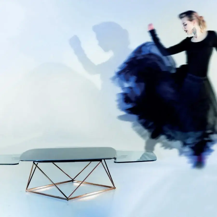 Exceptional Naos Uptown coffee table built with dark ceramic and glass plus rose-gold painted steel with satin finish