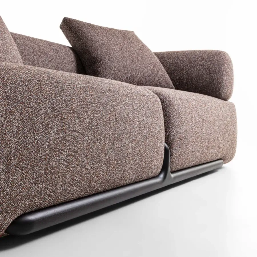 Refined Porada Klem sofa built with canaletto walnut and textured earthy brown reddish-orange textile upholstery with a dark matte finish