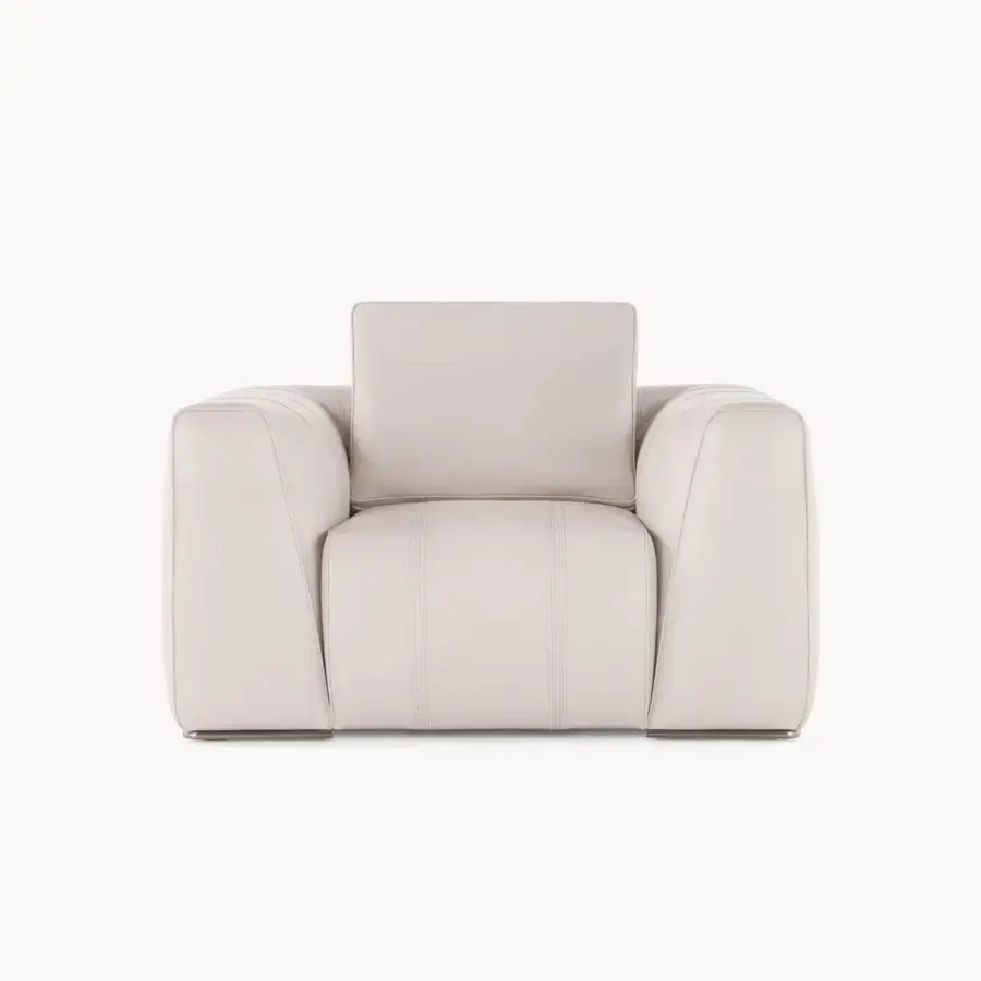 Sumptuous Visionnaire Loving F lounge chair upholstered in neutral beige leather with a smooth textured finish