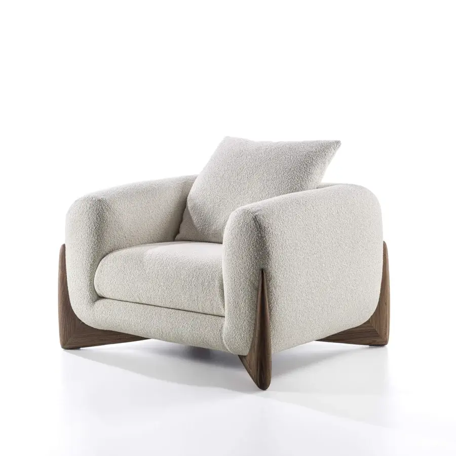 Harmonious Porada Softbay armchair with rounded silhouette, cotton bouclé upholstery and satin Canaletta walnut base