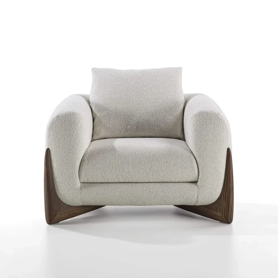 Exceptional Porada Softbay armchair with curved form, cotton bouclé upholstery and satin Canaletta walnut base