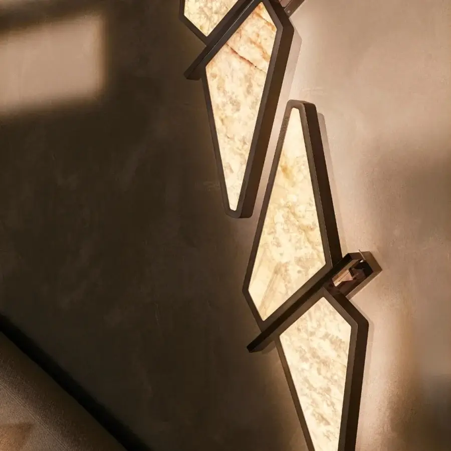 Exceptional Visionnaire Astralis wall lamp with shaped metal, backlit onyx and lightweight quartz in a striated satin finish