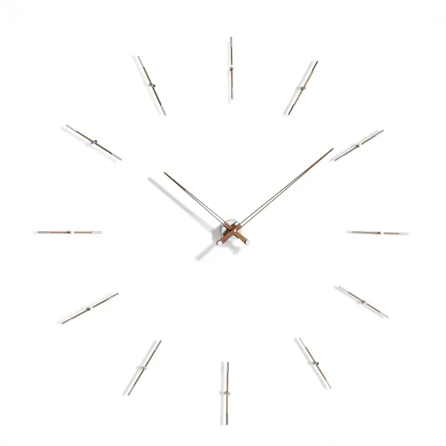 Superior Nomon Merlín wall clock with twelve unique time markers in balanced wood and metal with a satin finish