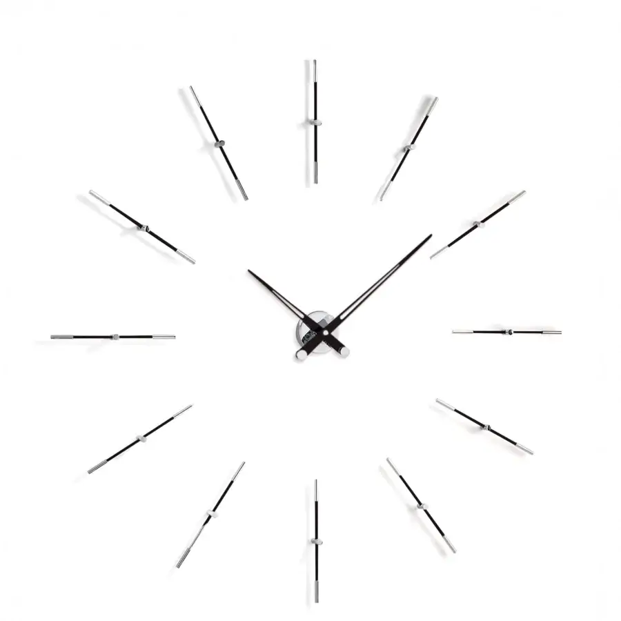 Elegant Nomon Merlín wall clock with floating hour markers in dark gray wood and metal with a satin finish
