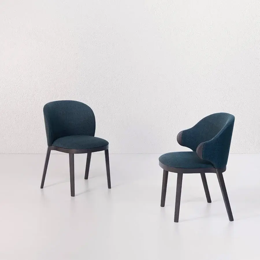 Elegant Potocco Trousse Hug chair in deep teal upholstery with dark satin-finished wood frame