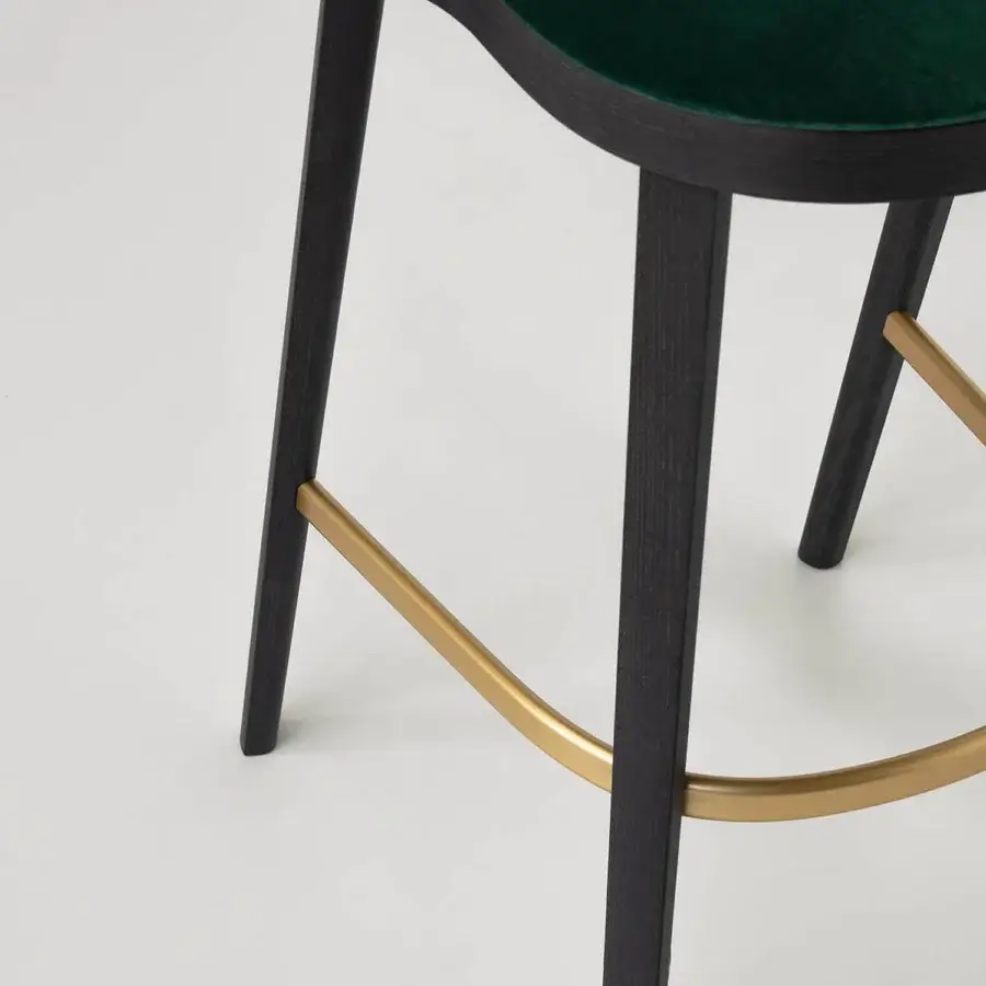Lavish Potocco Trousse stool crafted with solid ash wood, a satin gold footrest, and deeply saturated green velvet upholstery