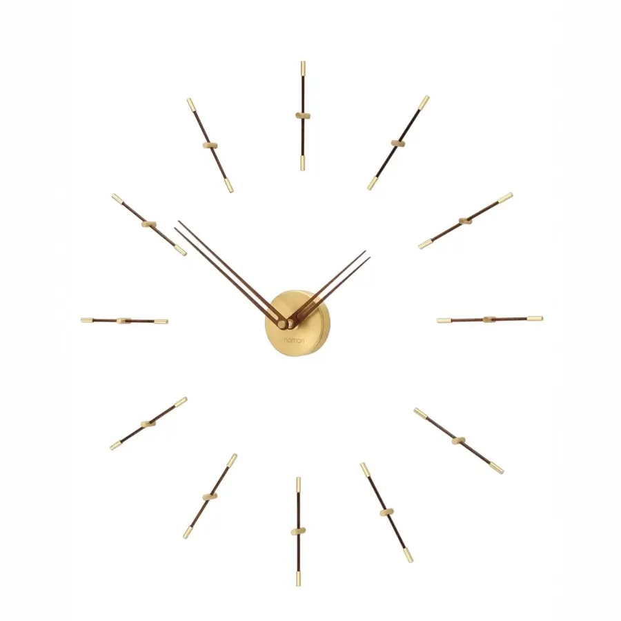 Distinguished Nomon Mini Merlín wall clock with a white face and gold-colored metal hour markers crafted in wood with a satin finish