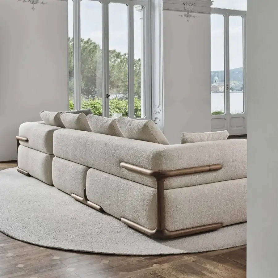 Lavish Porada Klem sectional with neutral beige fabric upholstery and solid canaletto walnut frame