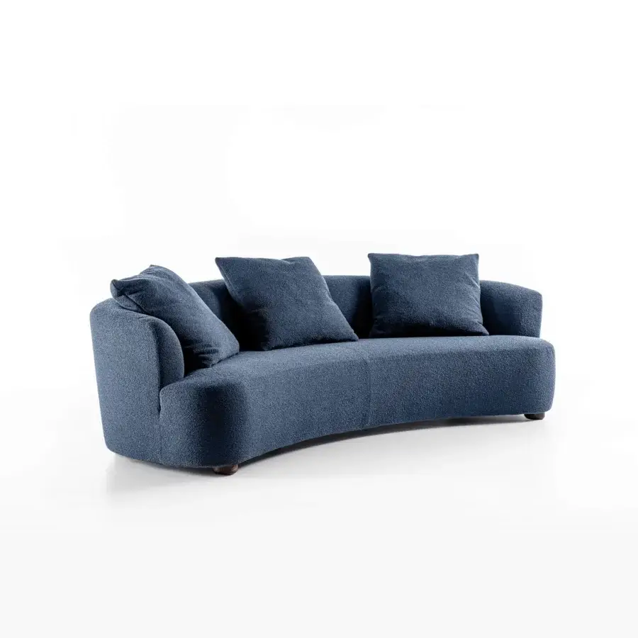 Elegant Porada Yves sofa upholstered in textured blue bouclé fabric with solid Canaletto walnut feet