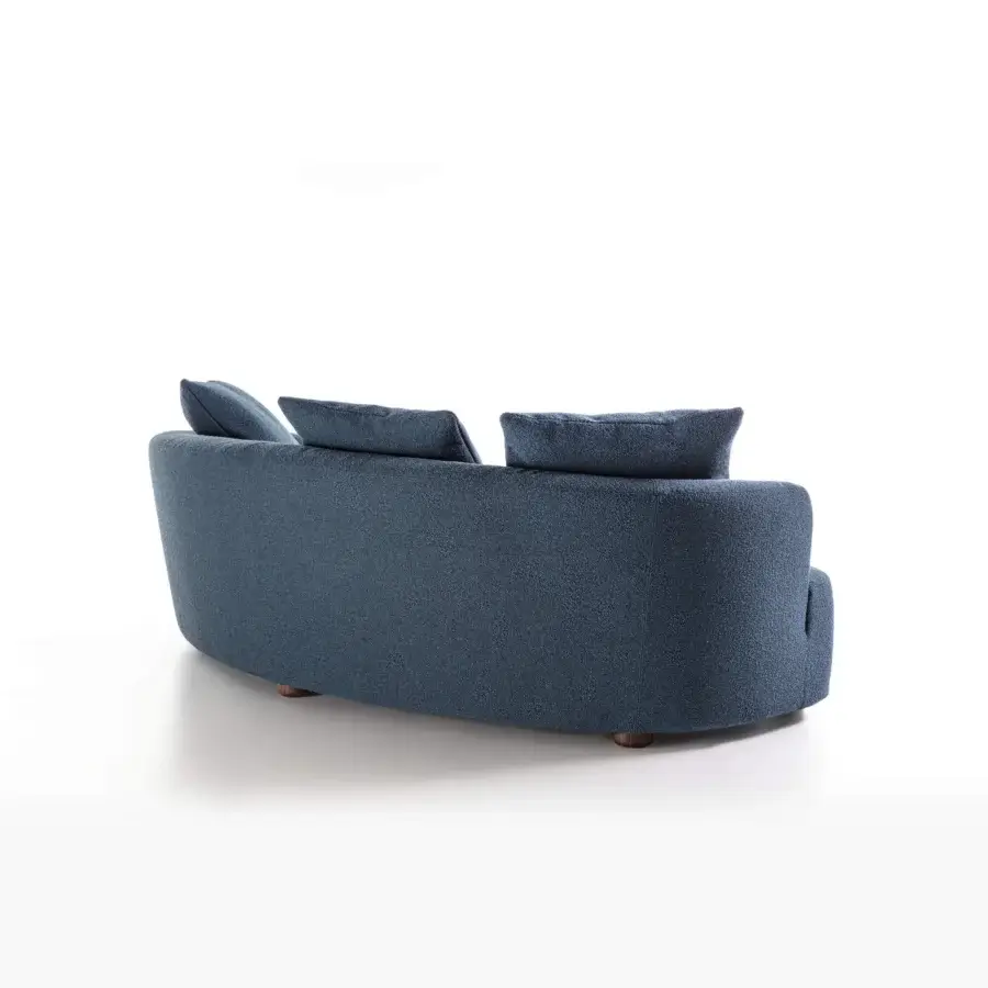 Superior Porada Yves sofa upholstered in deep blue textured textile with solid Canaletta walnut feet