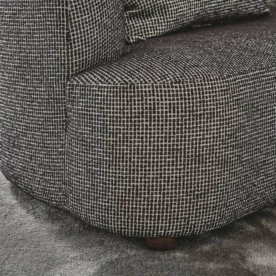 Superior Porada Yves sofa upholstered in textured off-white and dark gray fabric with solid Canaletto walnut feet